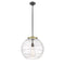 Deco Swirl Pendant shown in the Black Antique Brass finish with a Clear shade