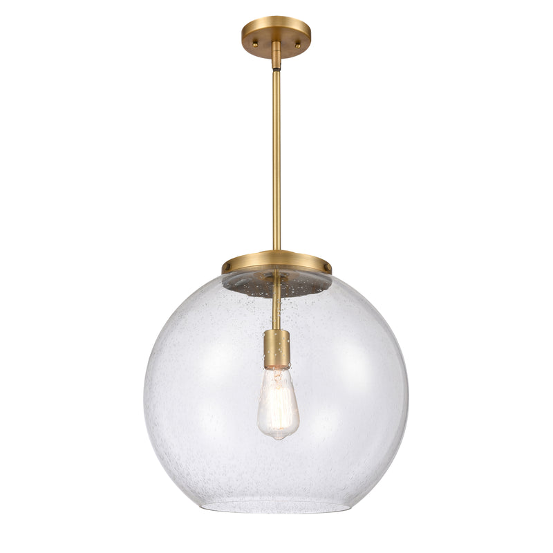 Athens Pendant shown in the Brushed Brass finish with a Seedy shade