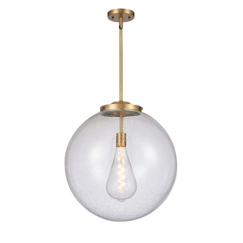 Beacon Pendant shown in the Brushed Brass finish with a Seedy shade