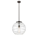 Deco Swirl Pendant shown in the Oil Rubbed Bronze finish with a Clear shade