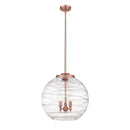 Deco Swirl Pendant shown in the Antique Copper finish with a Clear shade