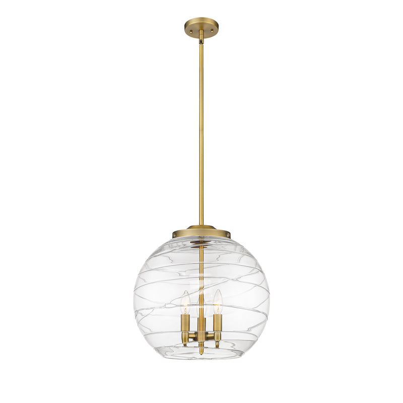 Deco Swirl Pendant shown in the Brushed Brass finish with a Clear shade