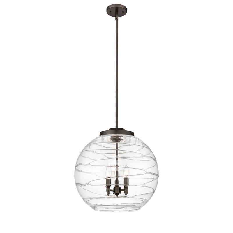 Deco Swirl Pendant shown in the Oil Rubbed Bronze finish with a Clear shade