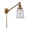 Canton Swing Arm shown in the Brushed Brass finish with a Clear shade