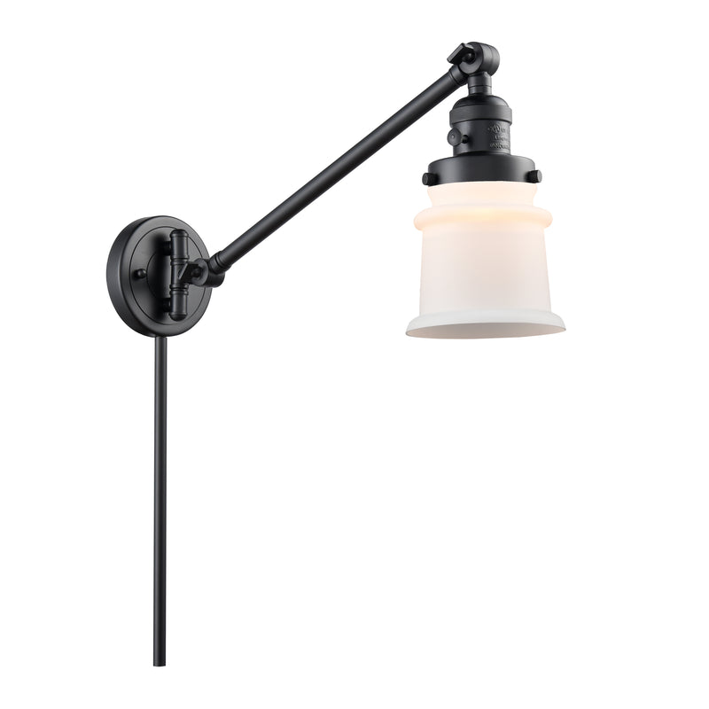 Canton Swing Arm shown in the Matte Black finish with a Matte White shade