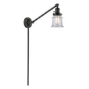 Canton Swing Arm shown in the Oil Rubbed Bronze finish with a Clear shade