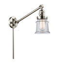 Canton Swing Arm shown in the Polished Nickel finish with a Clear shade