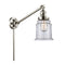 Canton Swing Arm shown in the Polished Nickel finish with a Clear shade
