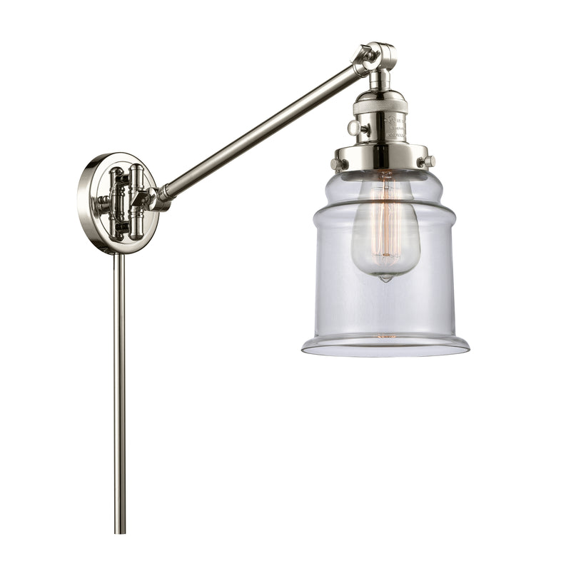 Canton Swing Arm shown in the Polished Nickel finish with a Clear shade