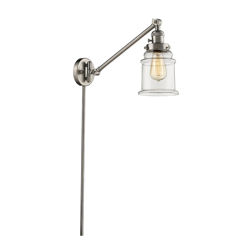 Canton Swing Arm shown in the Brushed Satin Nickel finish with a Clear shade