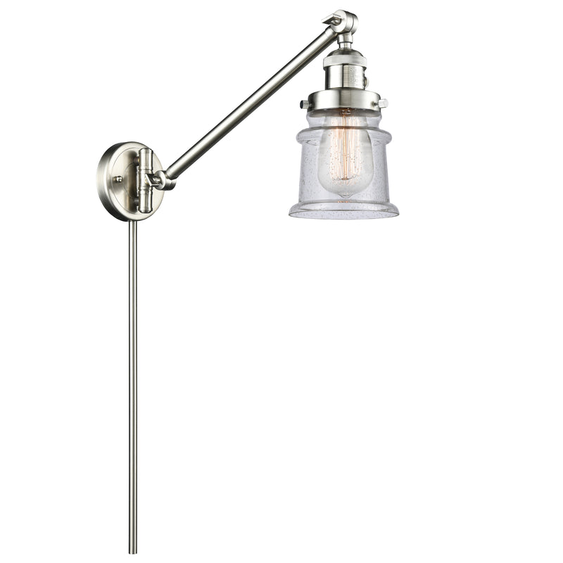Canton Swing Arm shown in the Brushed Satin Nickel finish with a Seedy shade