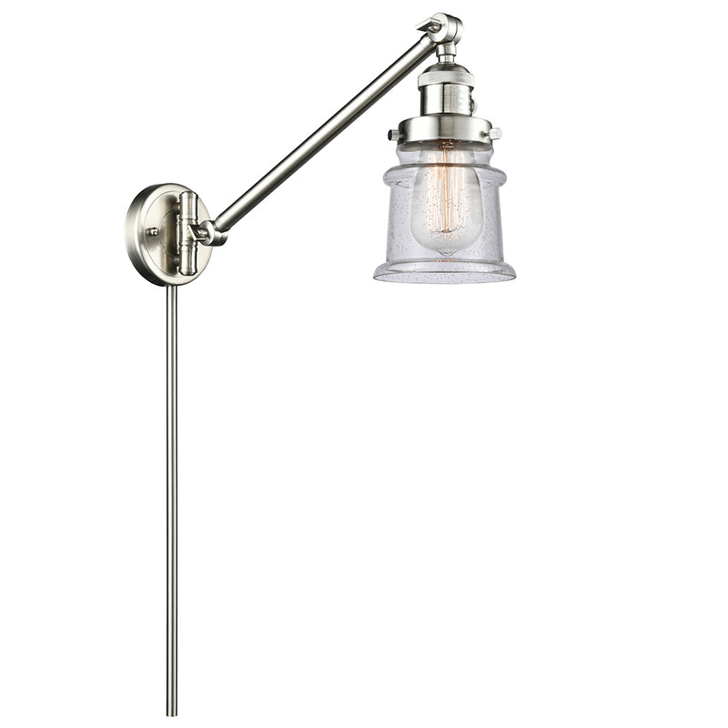 Canton Swing Arm shown in the Brushed Satin Nickel finish with a Seedy shade