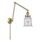 Canton Swing Arm shown in the Antique Brass finish with a Clear shade