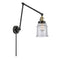 Canton Swing Arm shown in the Black Antique Brass finish with a Seedy shade