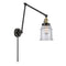 Canton Swing Arm shown in the Black Antique Brass finish with a Seedy shade
