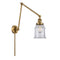 Canton Swing Arm shown in the Brushed Brass finish with a Clear shade