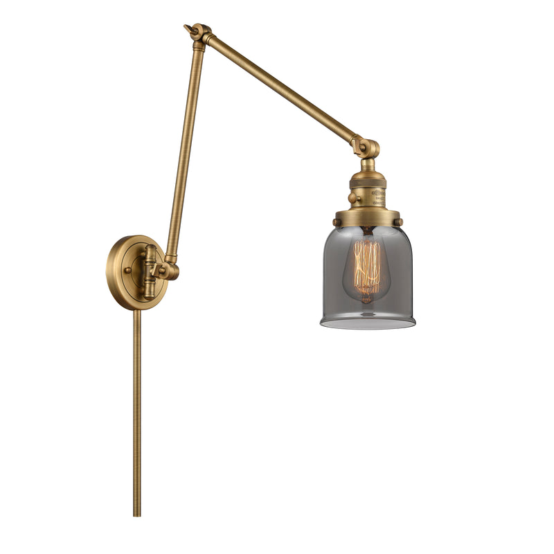 Bell Swing Arm shown in the Brushed Brass finish with a Plated Smoke shade