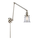Canton Swing Arm shown in the Polished Nickel finish with a Clear shade