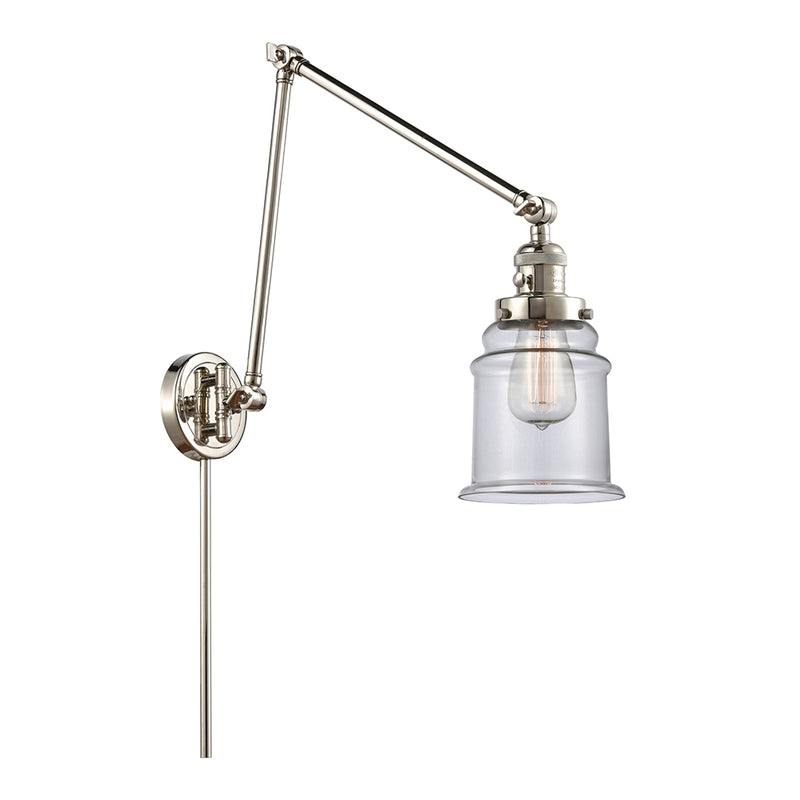Canton Swing Arm shown in the Polished Nickel finish with a Clear shade