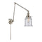 Canton Swing Arm shown in the Polished Nickel finish with a Seedy shade