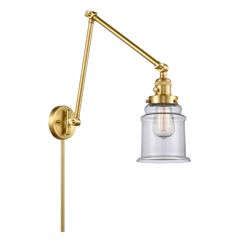 Canton Swing Arm shown in the Satin Gold finish with a Clear shade