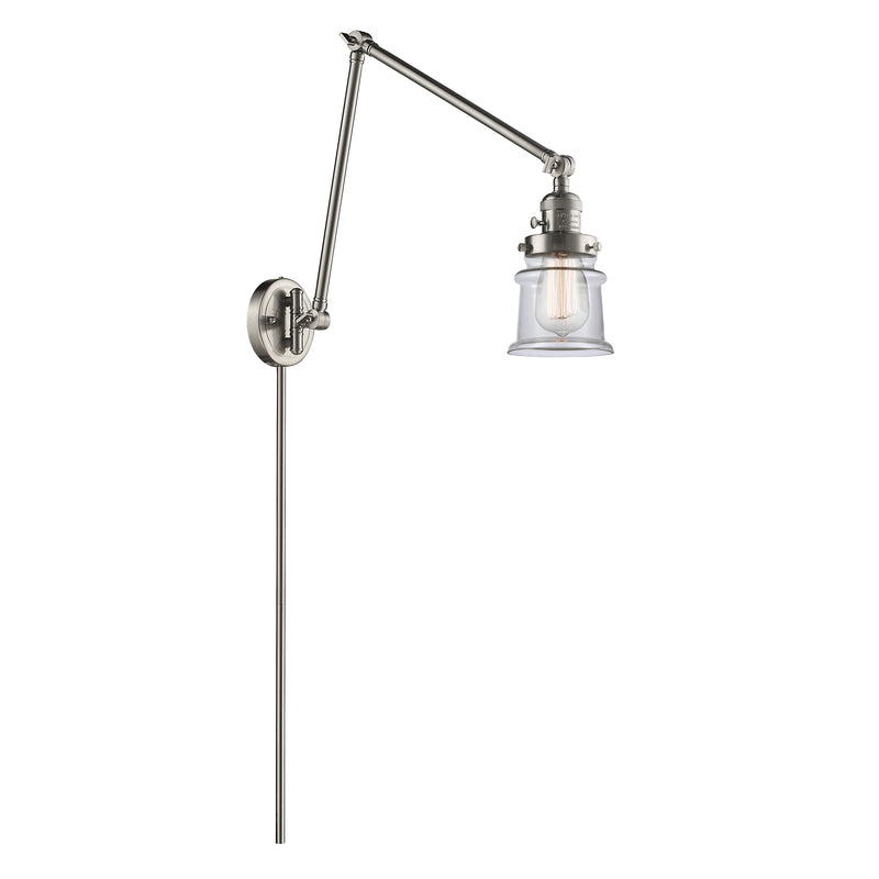 Canton Swing Arm shown in the Brushed Satin Nickel finish with a Clear shade