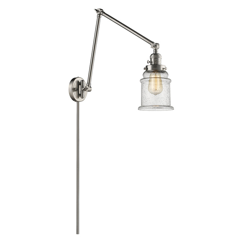 Canton Swing Arm shown in the Brushed Satin Nickel finish with a Seedy shade
