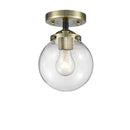 Beacon Semi-Flush Mount shown in the Black Antique Brass finish with a Clear shade