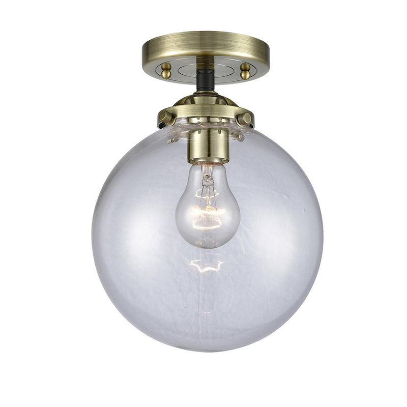 Beacon Semi-Flush Mount shown in the Black Antique Brass finish with a Clear shade