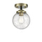 Beacon Semi-Flush Mount shown in the Black Antique Brass finish with a Seedy shade