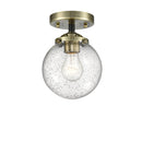 Beacon Semi-Flush Mount shown in the Black Antique Brass finish with a Seedy shade