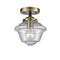 Oxford Semi-Flush Mount shown in the Black Antique Brass finish with a Seedy shade