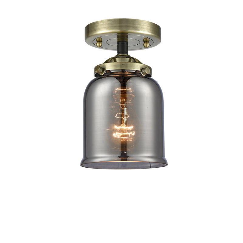 Bell Semi-Flush Mount shown in the Black Antique Brass finish with a Plated Smoke shade