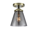 Cone Semi-Flush Mount shown in the Black Antique Brass finish with a Plated Smoke shade