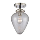 Geneseo Semi-Flush Mount shown in the Black Polished Nickel finish with a Clear Crackled shade