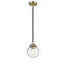 Beacon Mini Pendant shown in the Black Antique Brass finish with a Seedy shade
