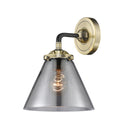 Cone Sconce shown in the Black Antique Brass finish with a Plated Smoke shade