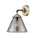 Cone Sconce shown in the Black Antique Brass finish with a Plated Smoke shade