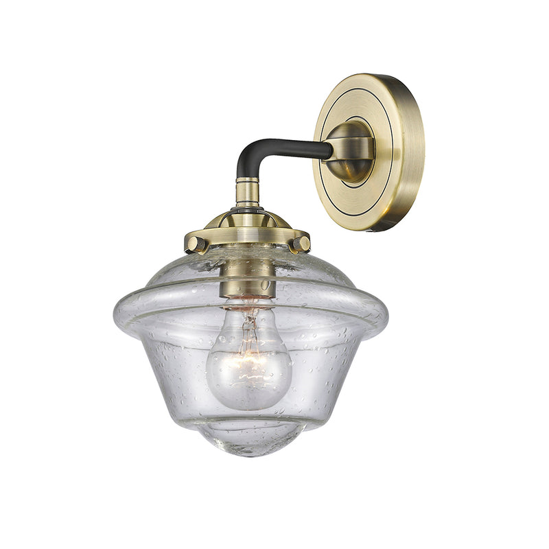 Oxford Sconce shown in the Black Antique Brass finish with a Seedy shade