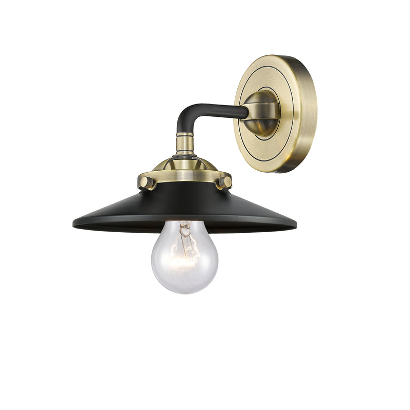 Railroad Sconce shown in the Black Antique Brass finish with a Matte Black shade