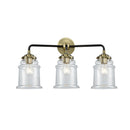 Canton Bath Vanity Light shown in the Black Antique Brass finish with a Clear shade