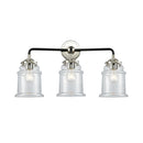 Canton Bath Vanity Light shown in the Black Polished Nickel finish with a Clear shade