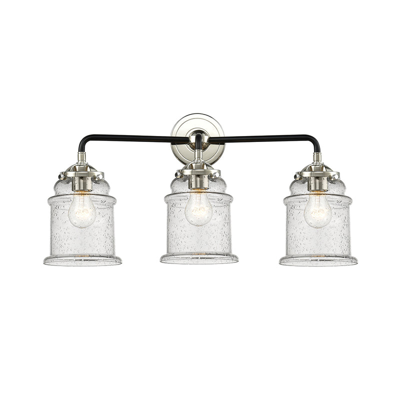 Canton Bath Vanity Light shown in the Black Polished Nickel finish with a Seedy shade