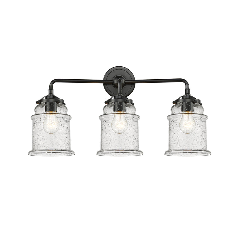 Canton Bath Vanity Light shown in the Oil Rubbed Bronze finish with a Seedy shade