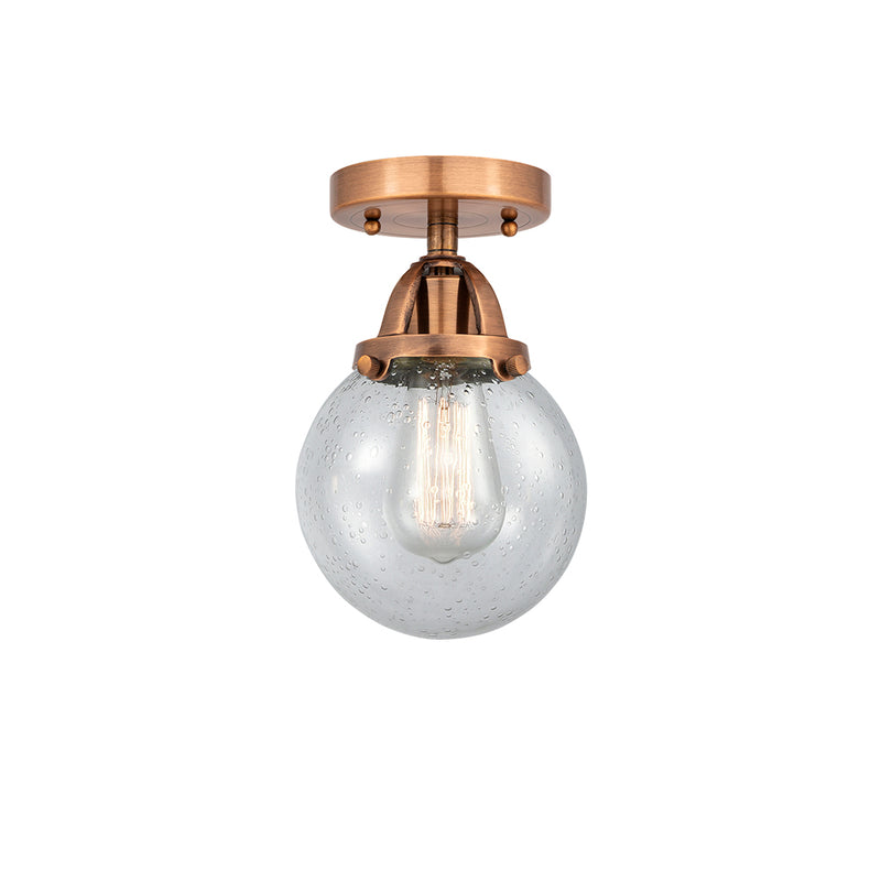 Beacon Semi-Flush Mount shown in the Antique Copper finish with a Seedy shade