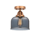 Bell Semi-Flush Mount shown in the Antique Copper finish with a Plated Smoke shade