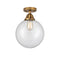 Beacon Semi-Flush Mount shown in the Brushed Brass finish with a Clear shade