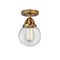 Beacon Semi-Flush Mount shown in the Brushed Brass finish with a Clear shade