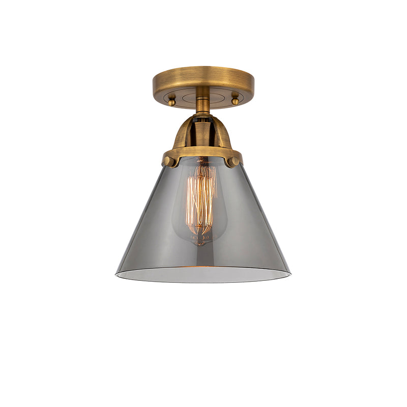 Cone Semi-Flush Mount shown in the Brushed Brass finish with a Plated Smoke shade