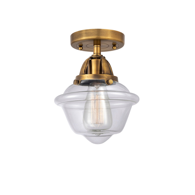 Oxford Semi-Flush Mount shown in the Brushed Brass finish with a Clear shade